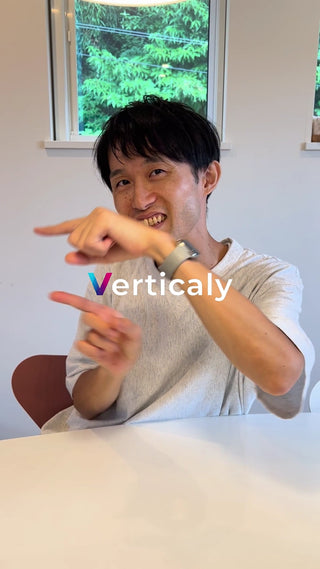 指差し、言葉は垂直に