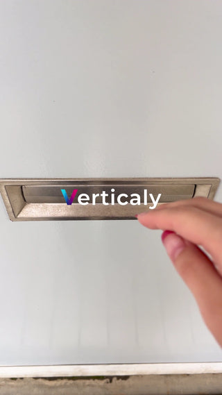 Hand in the mailbox, posting a letter