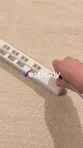 Insert the cord into the power strip