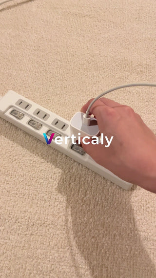 Insert the charger into the power strip