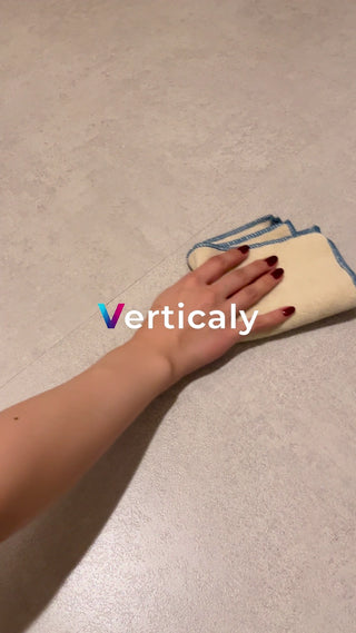 Woman holding a dishcloth in her hands