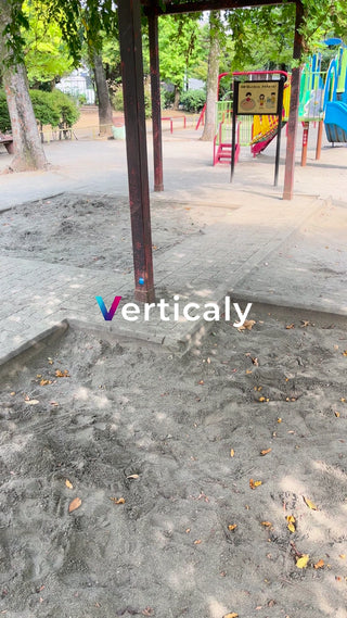 Children playing in the sandbox in the park