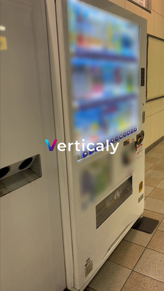 standing in front of the vending machine