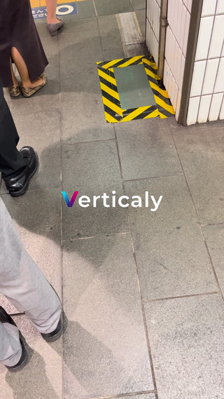 Station platform, people standing still