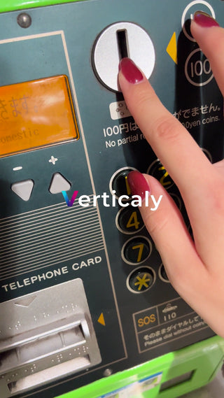 Insert coin at phone booth