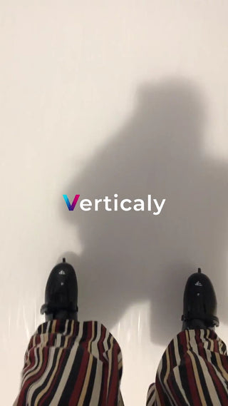 A person holding an umbrella, rainy day scenery