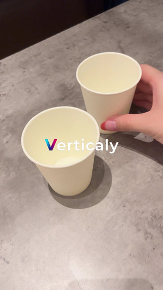 Paper cup and hand, a scene from everyday life