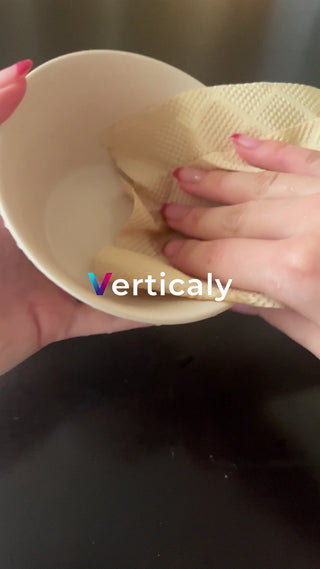 pour water into a paper cup