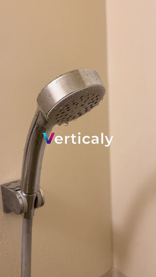 Water dripping from the shower head, taking a bath