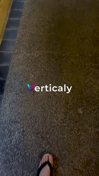 The cityscape below my feet, a summer afternoon