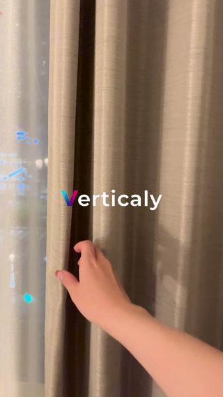 Hand opening the curtain