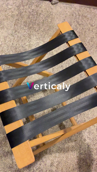 Sitting on a chair, black belt