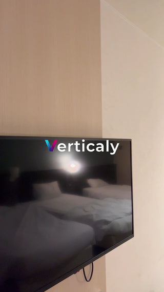 Hotel bed, light and shadow