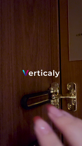 Hand operating the door guard