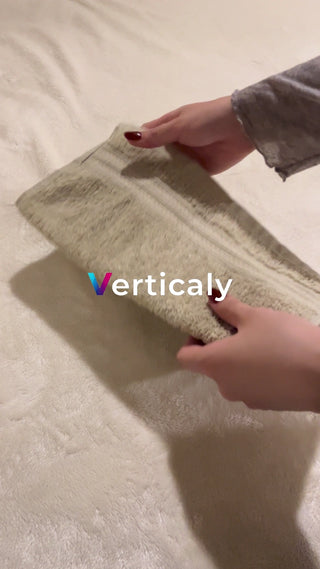 Folding towels with careful gestures