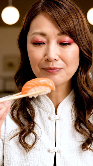 寿司を食べる女性、至福の時